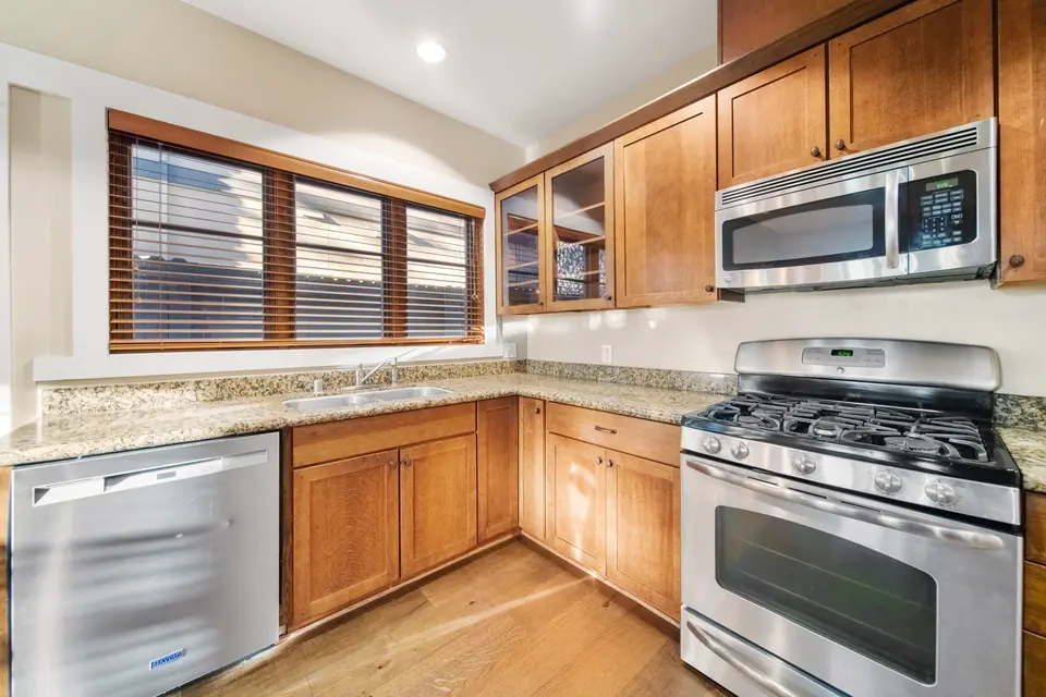 Kitchen range, microwave and dishwasher