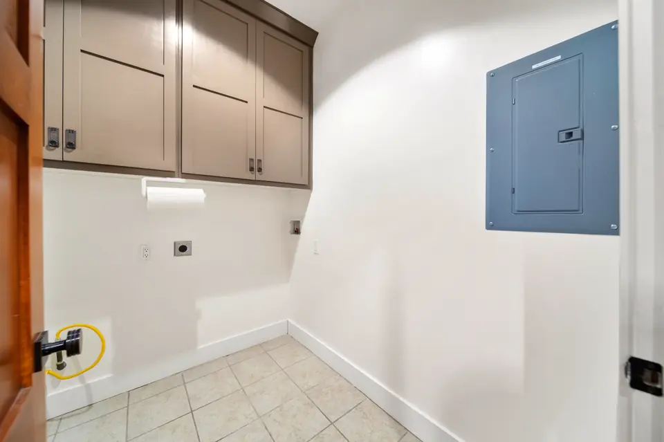 Laundry room with cabinets
