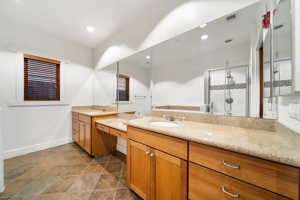 Double vanity with a wide mirror
