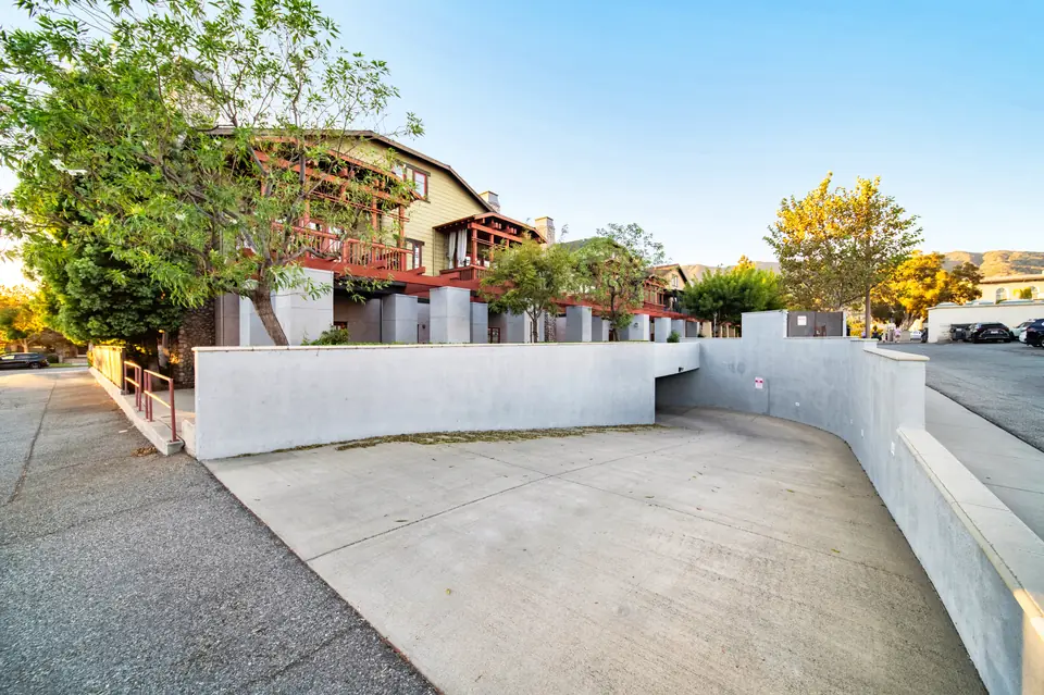Driveway ramp down to the parking garage